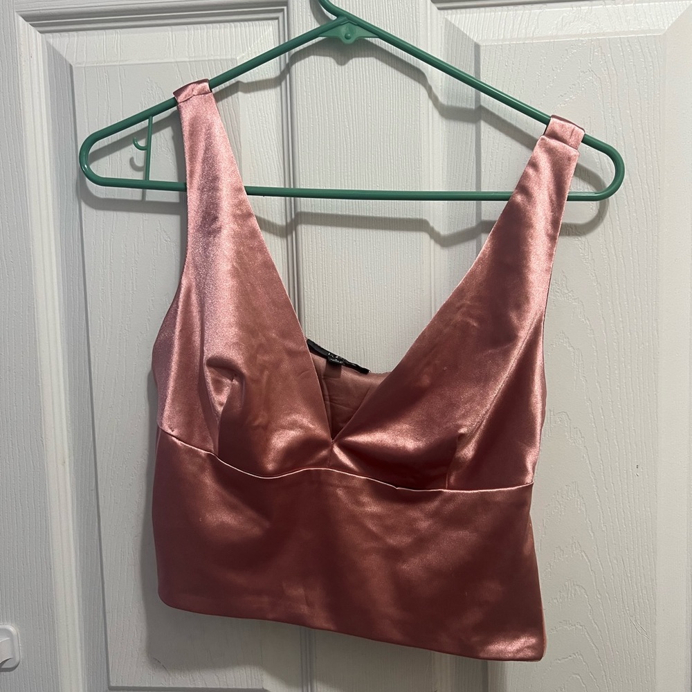 Satin Lulu’s top size small. Too large for my chest so the straps fell down